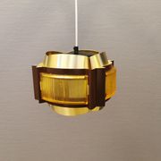 Danish hanging lamp, made in brass colored and brown metal, with yellowish hard pressed plastic deta
