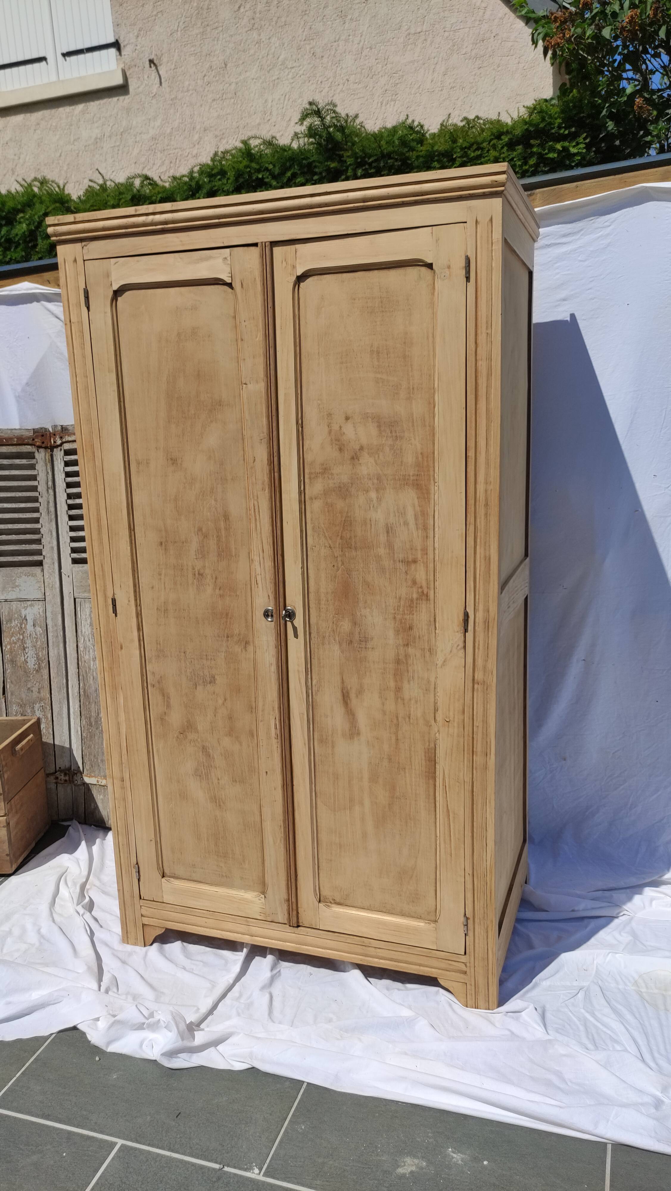 Parisian wardrobe in raw wood