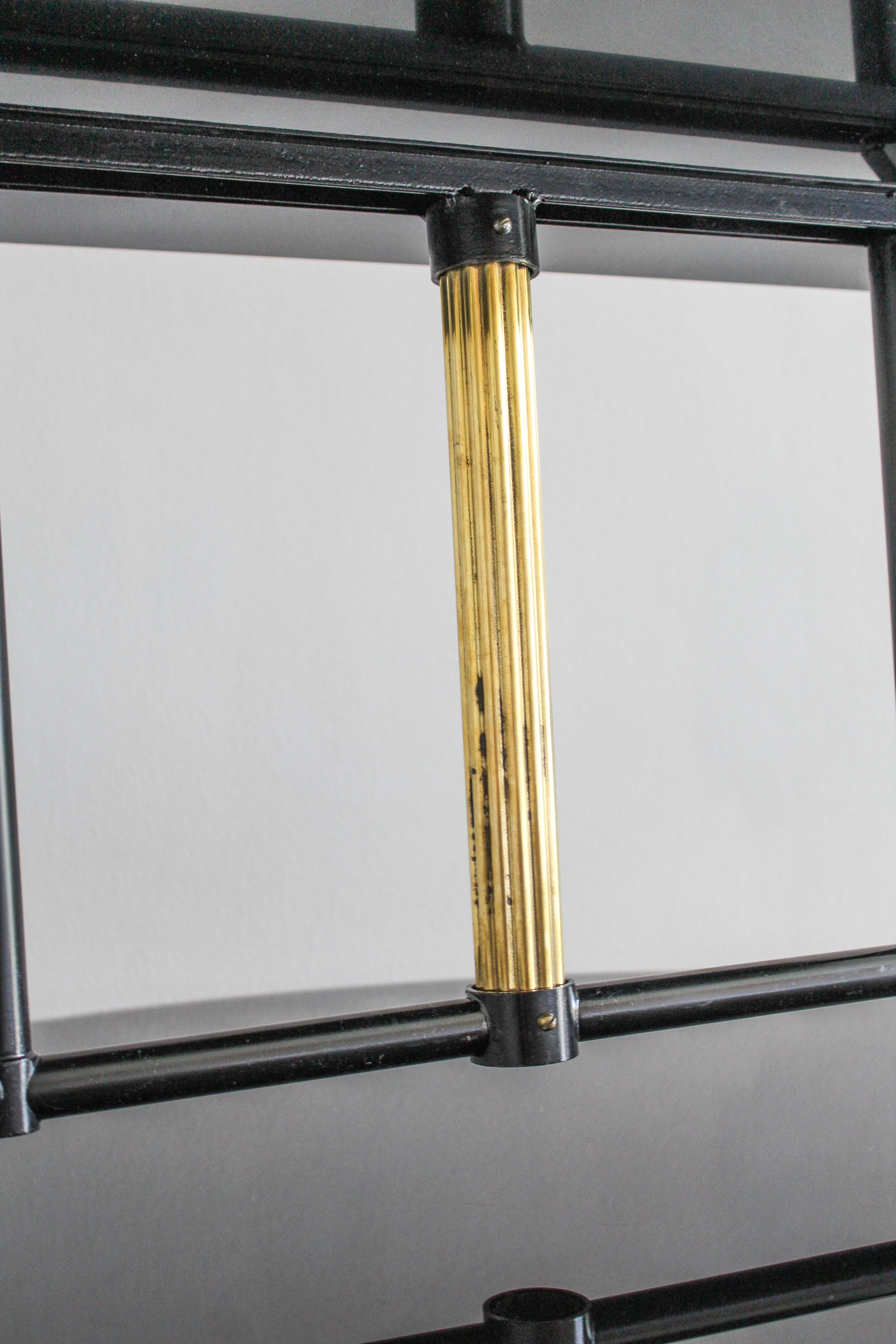 Coffee table in black glass lacquered brass and iron, Italy 50s