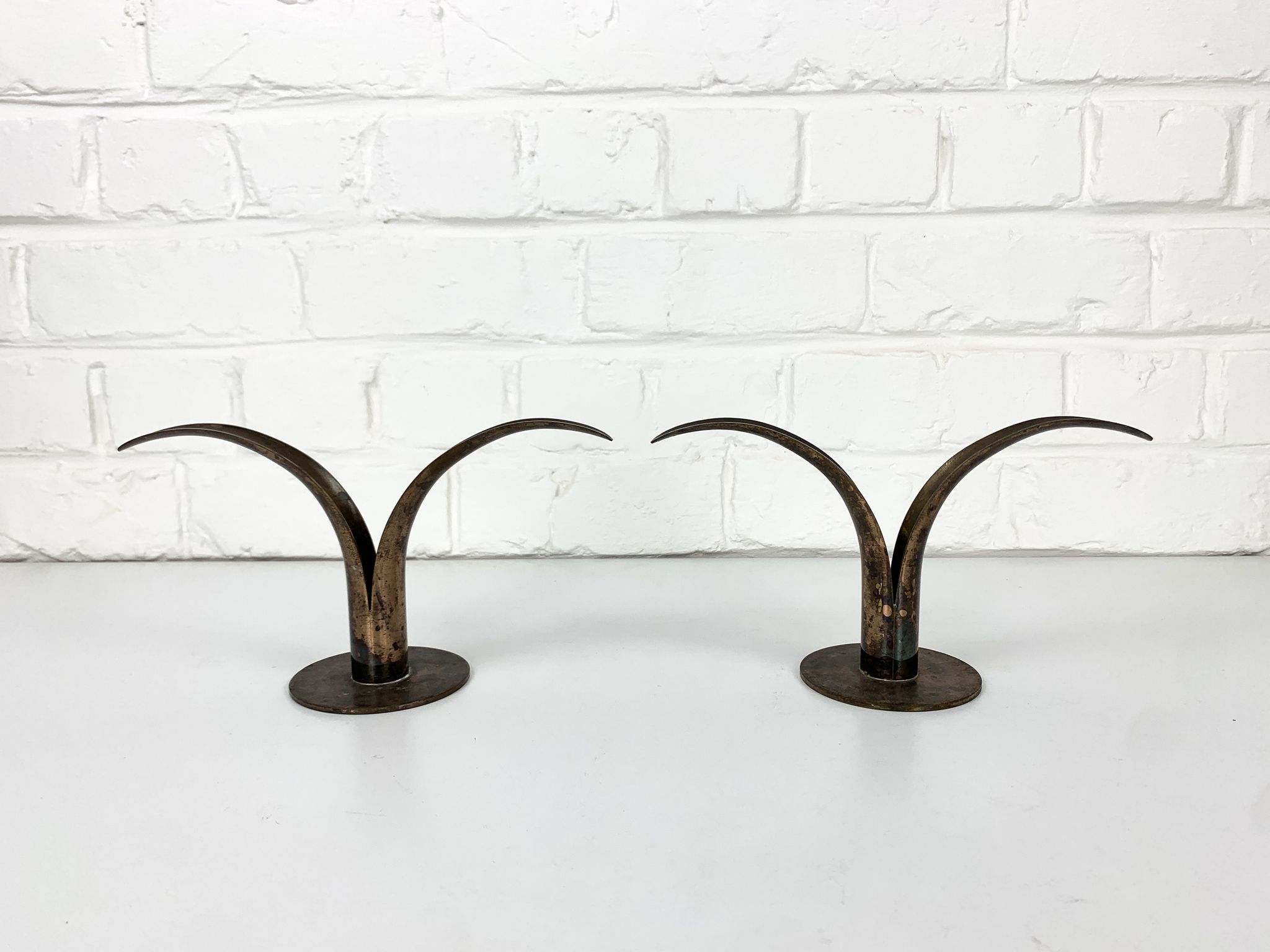 Pair of Lily brass candle holders, Ystad Metall, Sweden, design Ivar Ålenius Björk