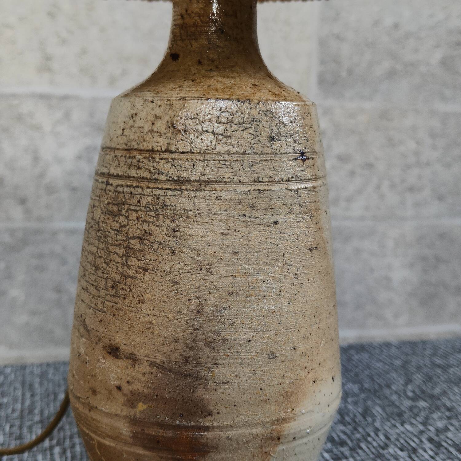 Patinated sandstone and jute ceramic lamp