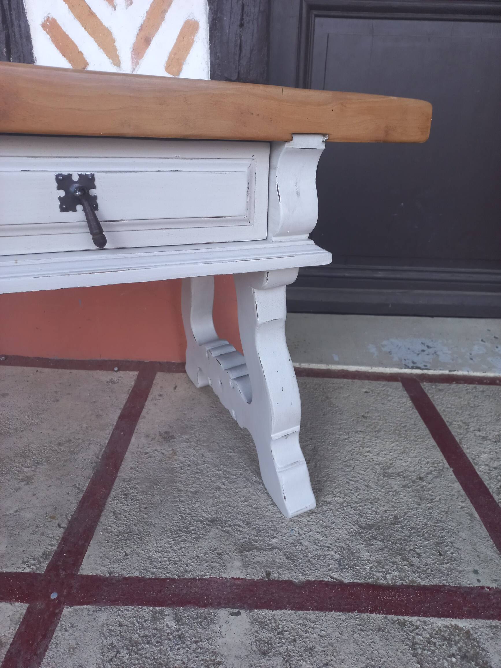 Patinated linen coffee table with raw top