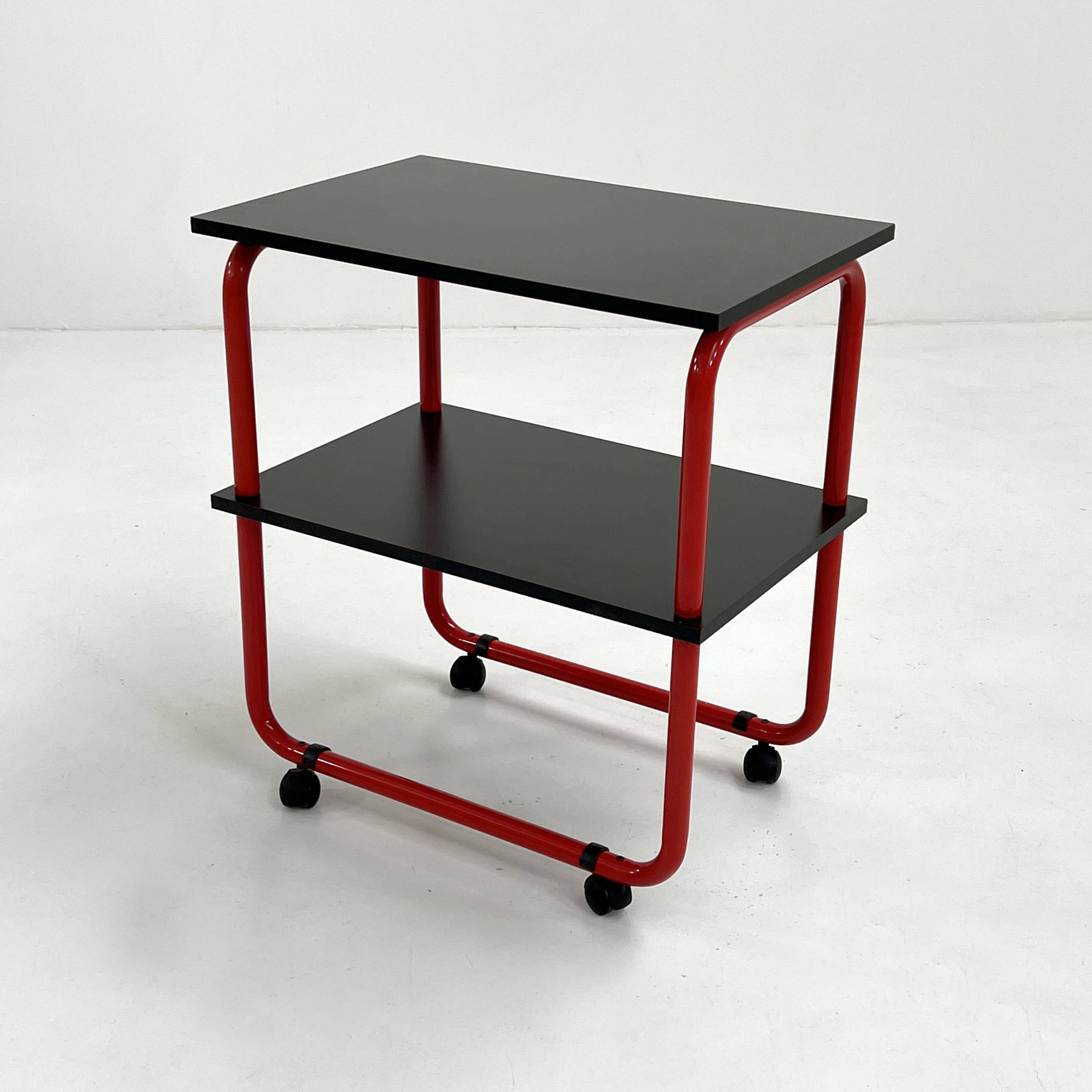 Tubular metal and wood serving trolley, 1980