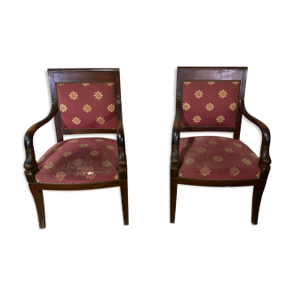 Pair of empire-style armchairs with dolphins