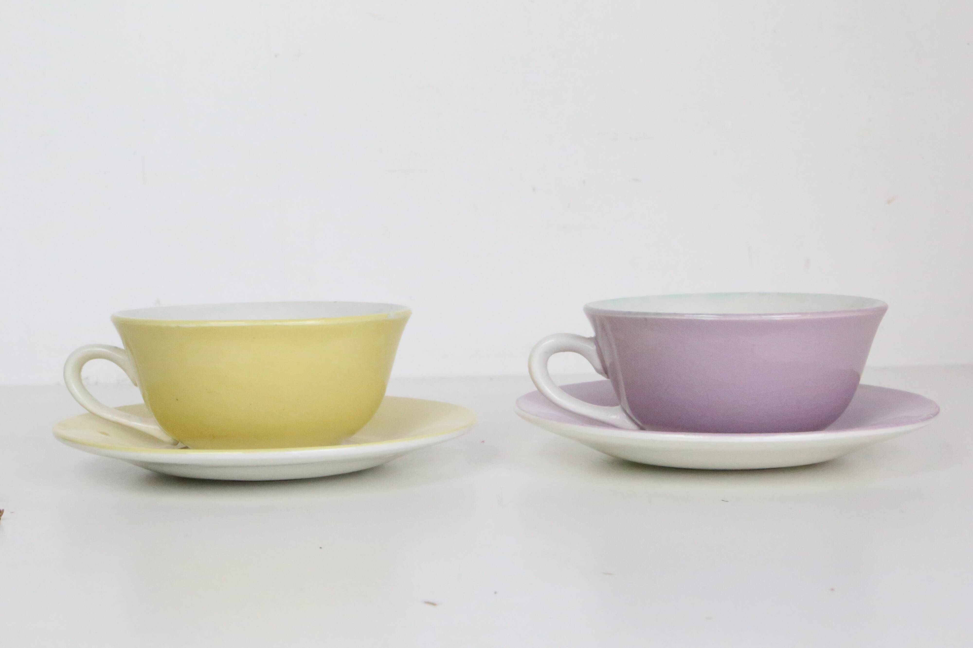 Duo of yellow and purple cups + vintage saucers