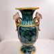 Vase en barbotine émaillée à décor d'oiseaux et bambou
