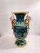 Glazed earthenware vase with a decoration of small birds and bamboo.