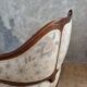 Small sofa or bench in Louis XV style, rococo.