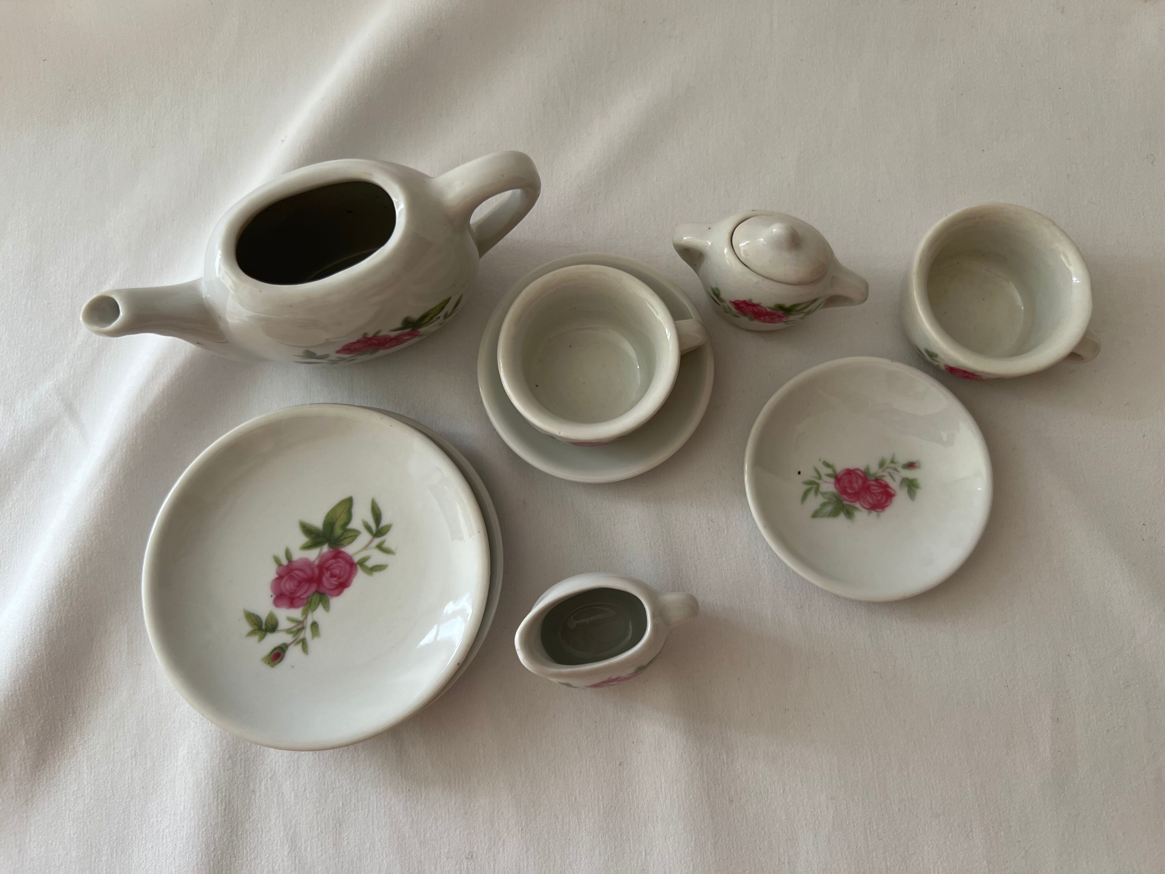 Miniature tea set with pink flowers for children