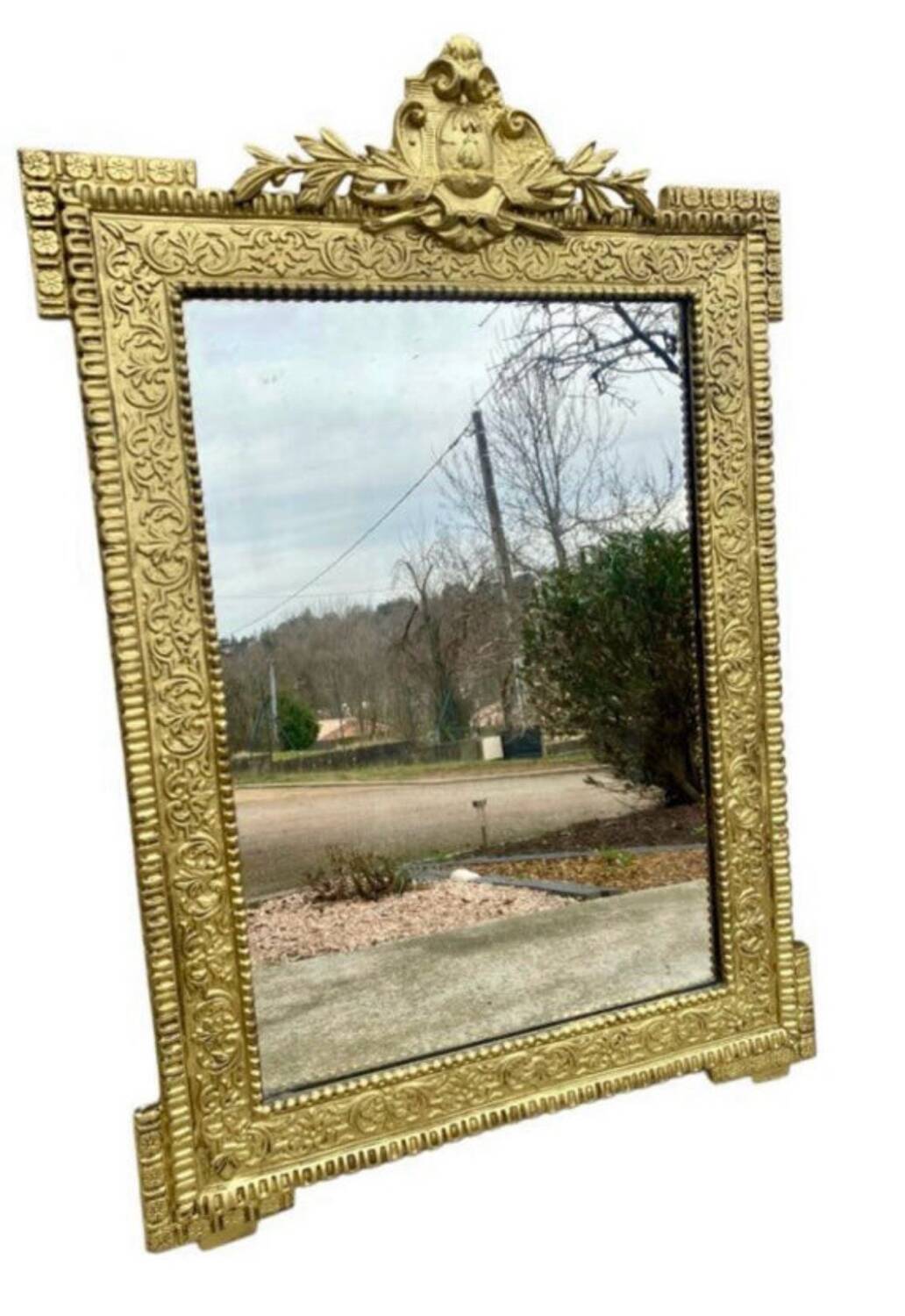 19th-century antique mirror in carved gilded wood, Napoleon style.
