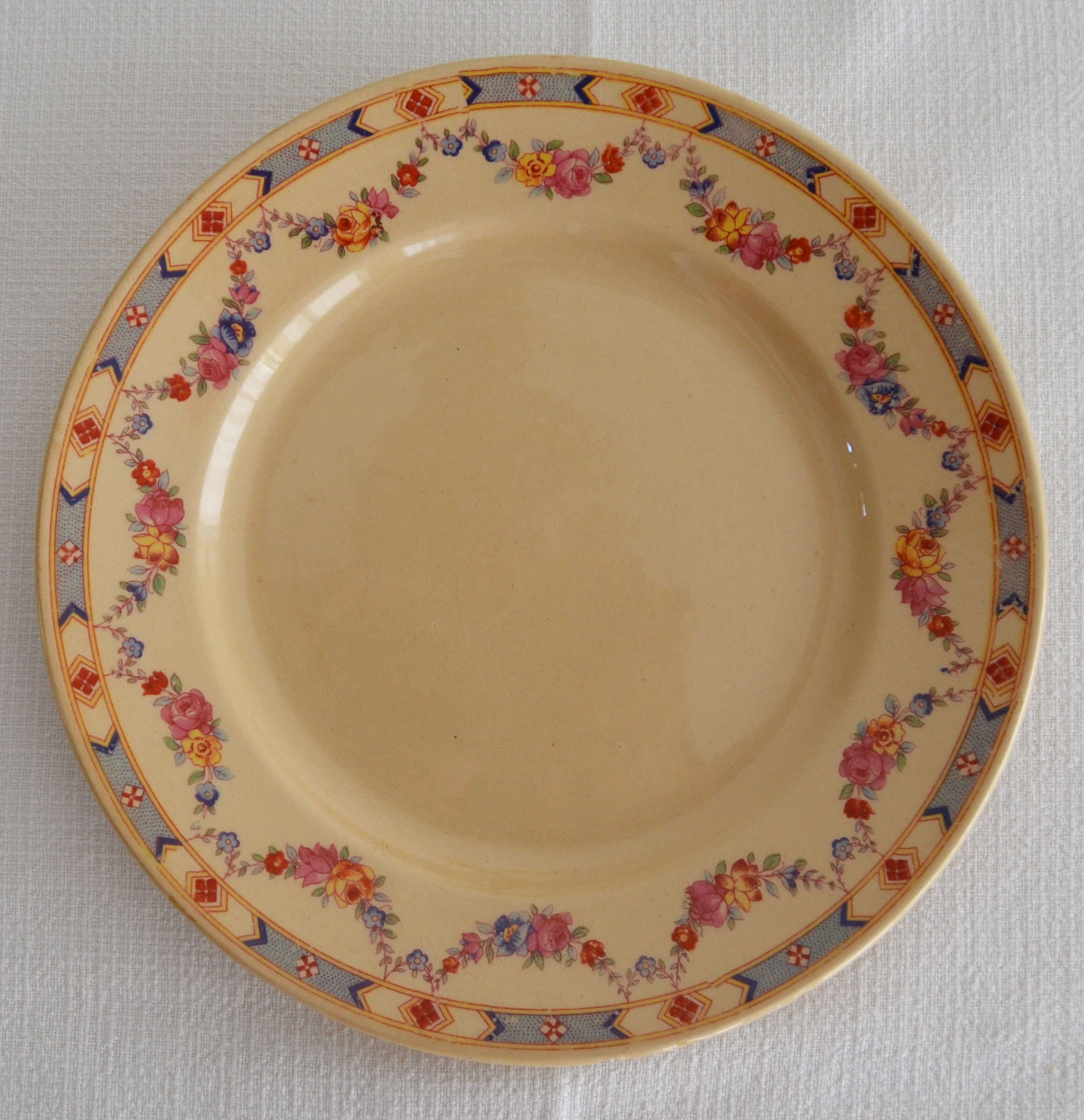 4 old flowered iron earth dessert plates