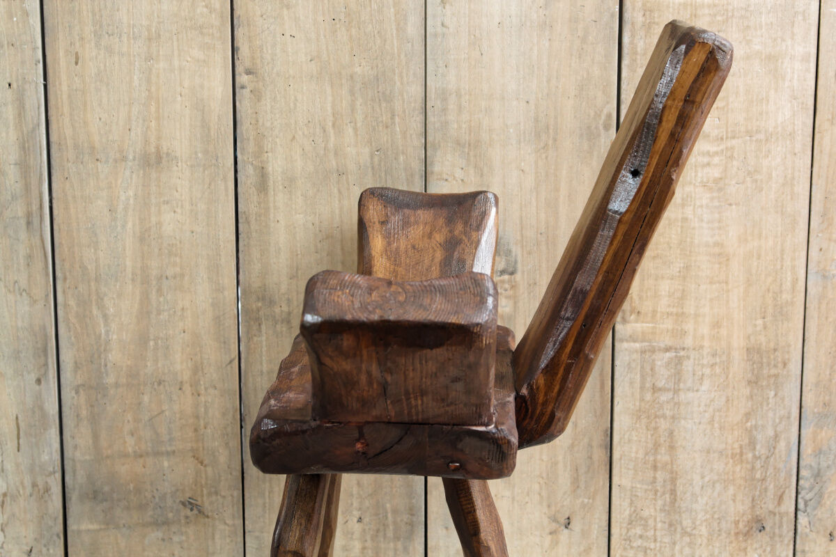 Pair of brutalist chairs made of raw wood
