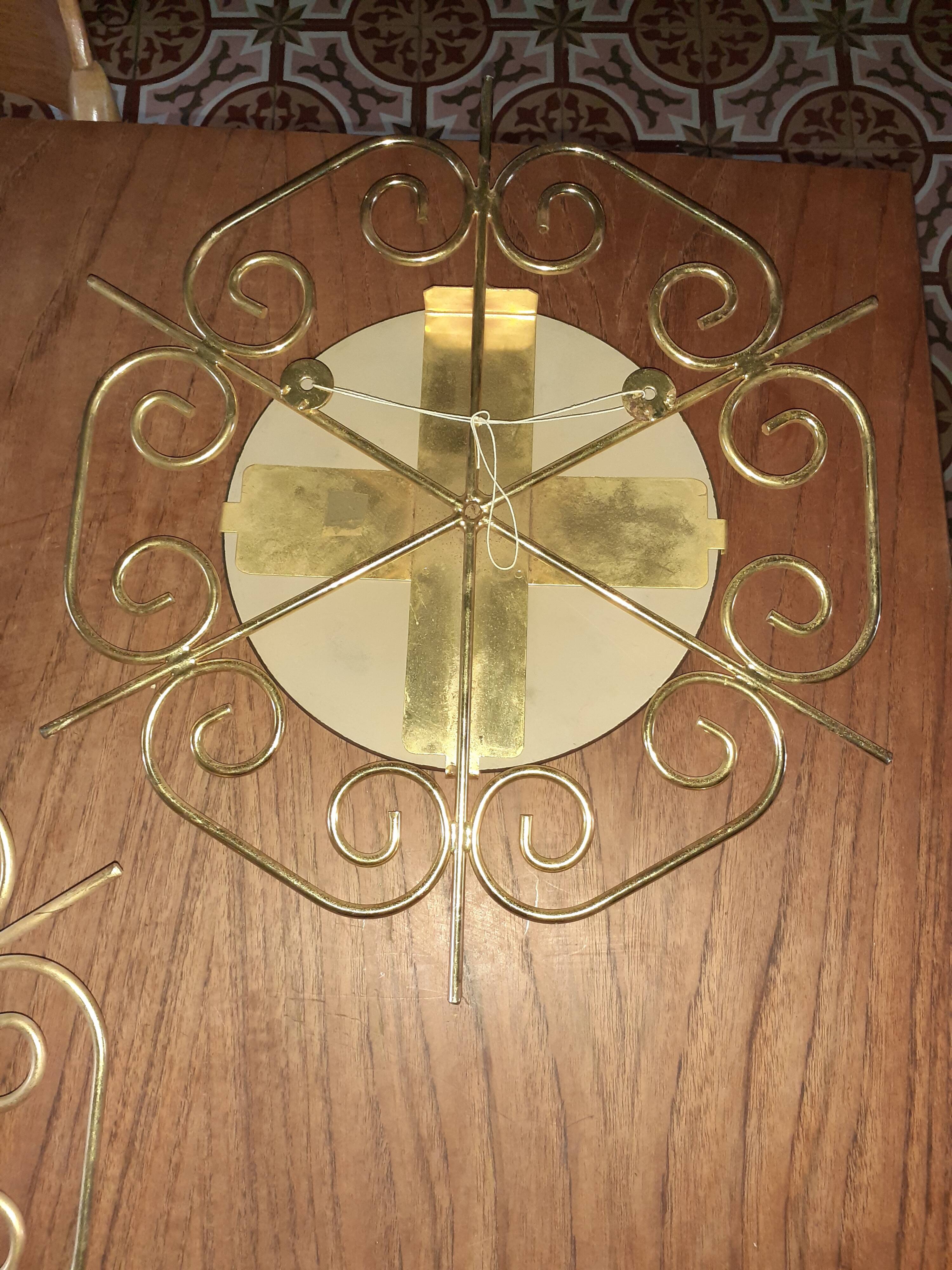Pair of 60s golden metal mirrors