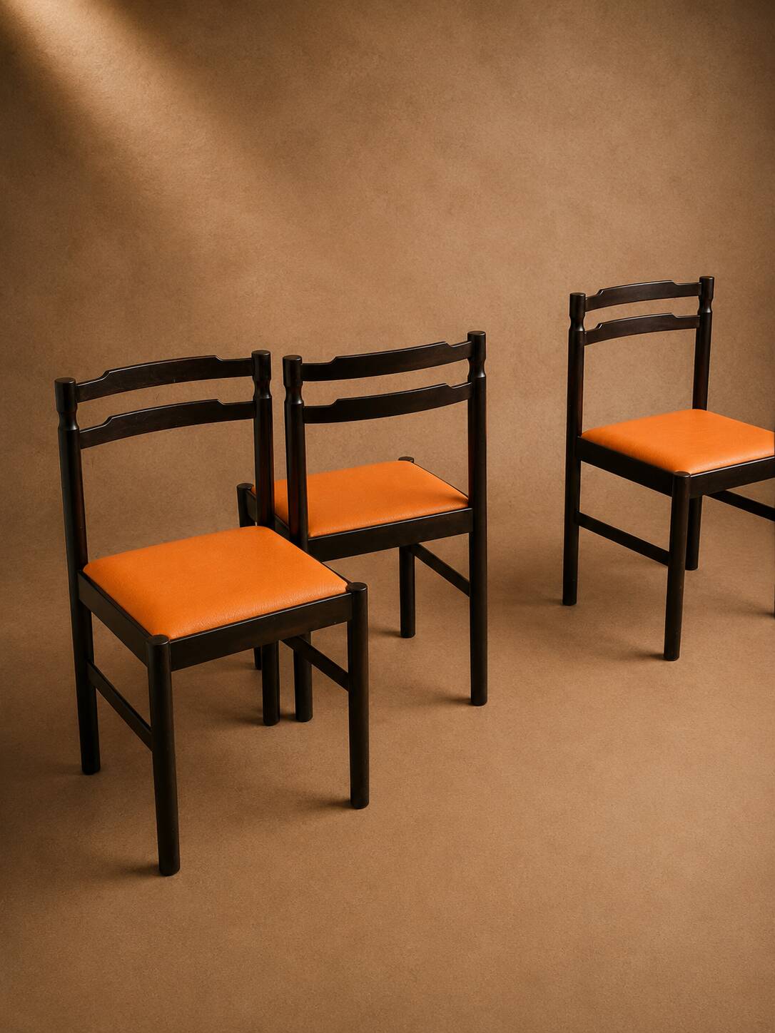 Set of 4 Mid-century beech / faux leather chairs.