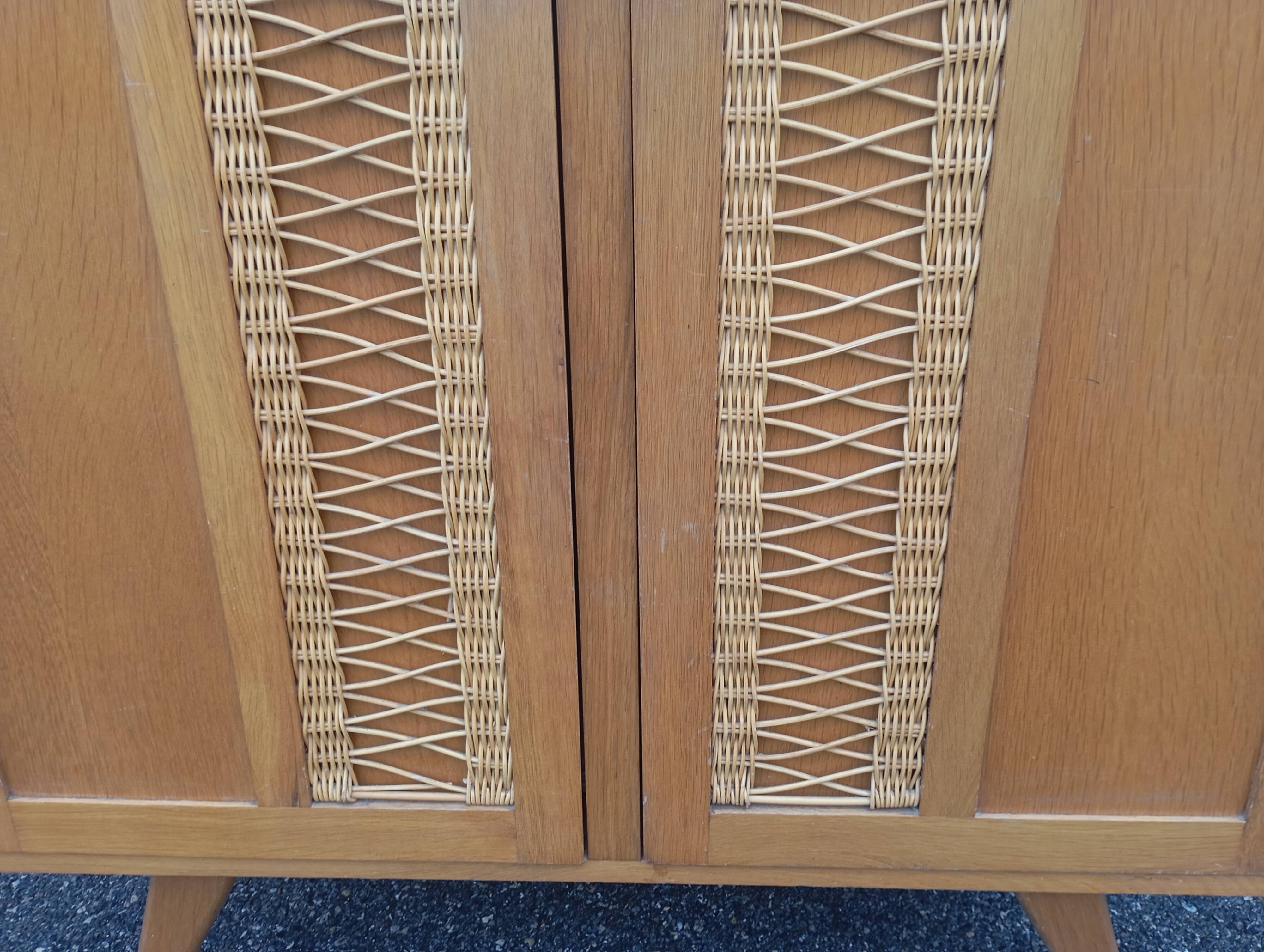 Vintage oak and rattan wardrobe