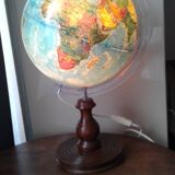 World map globe bright foot and wooden support