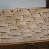 A pair of modern and sculptural vintage Danish armchairs in oak and papercord, 1940s.
