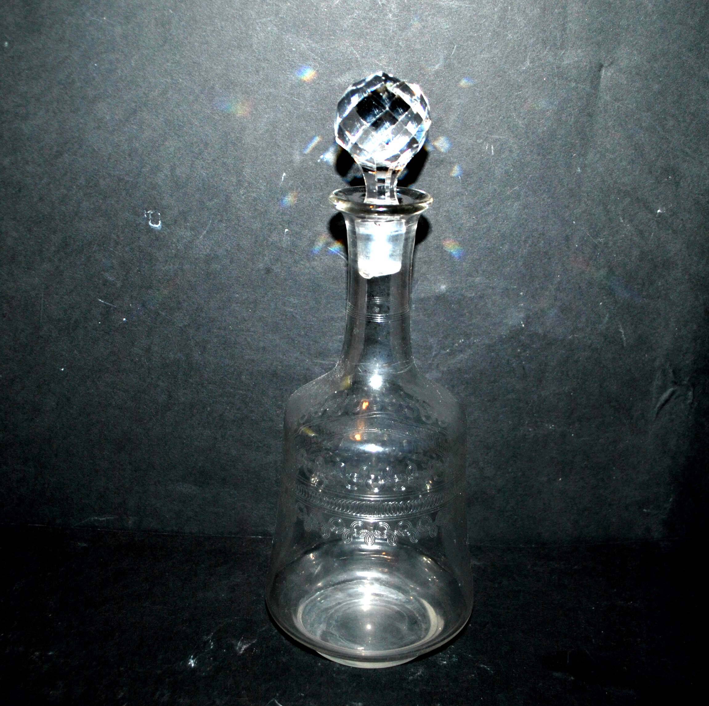 Old acid-etched crystal carafe