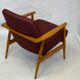 Chair created by Mr. Zieliski year 60 burgundy fabric.