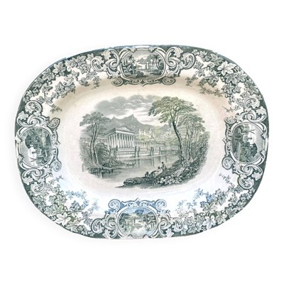 Plat en terre de fer décor antique