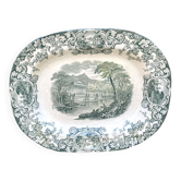 Plat en terre de fer décor antique