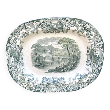 Plat en terre de fer décor antique