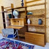 Modular wall-mounted bookcase in walnut