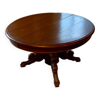 Oval table with griffin head base