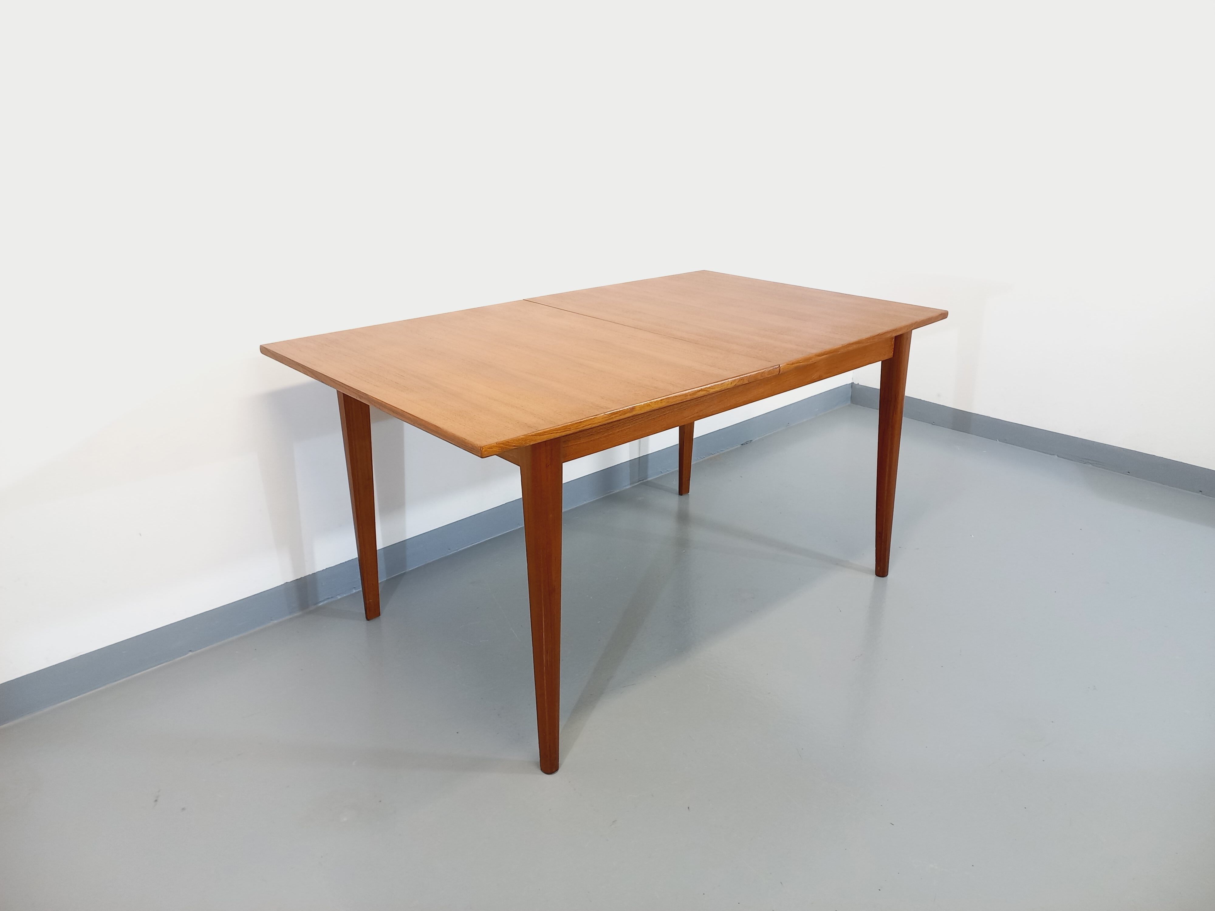 Vintage Scandinavian dining table from 50s 60s teak with extension