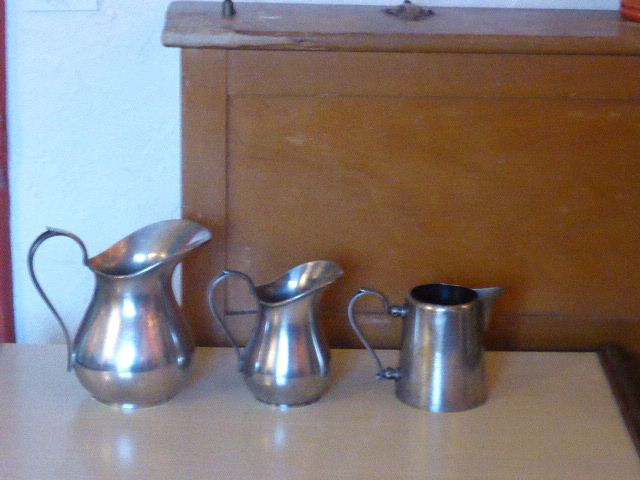 Coffee set in silver metal composed of 3 pitchers, Millan Freres, Paris