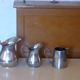 Coffee set in silver metal composed of 3 pitchers, Millan Freres, Paris