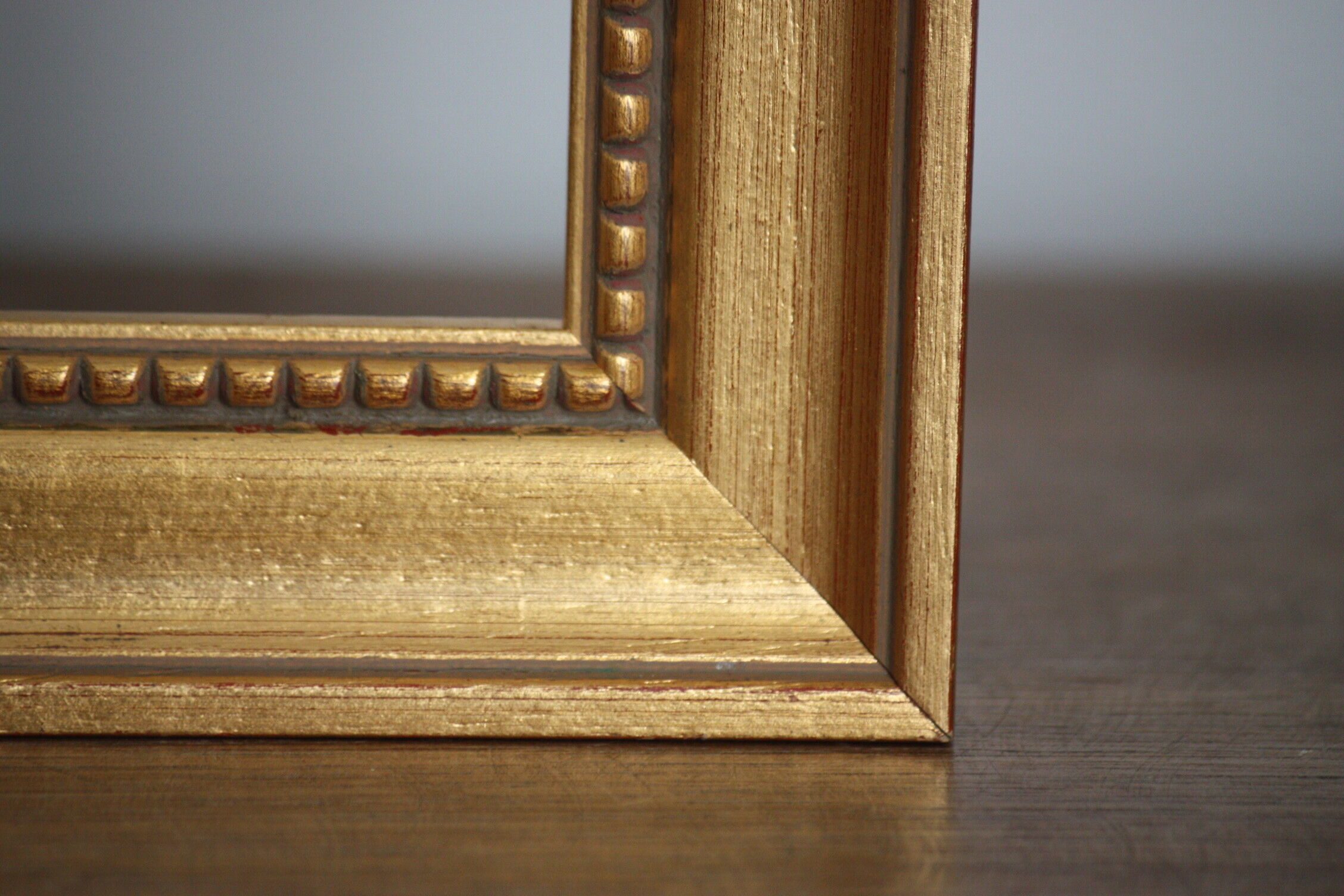 Carved and moulded gilded wood frame