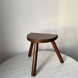 Varnished wooden stool with three legs