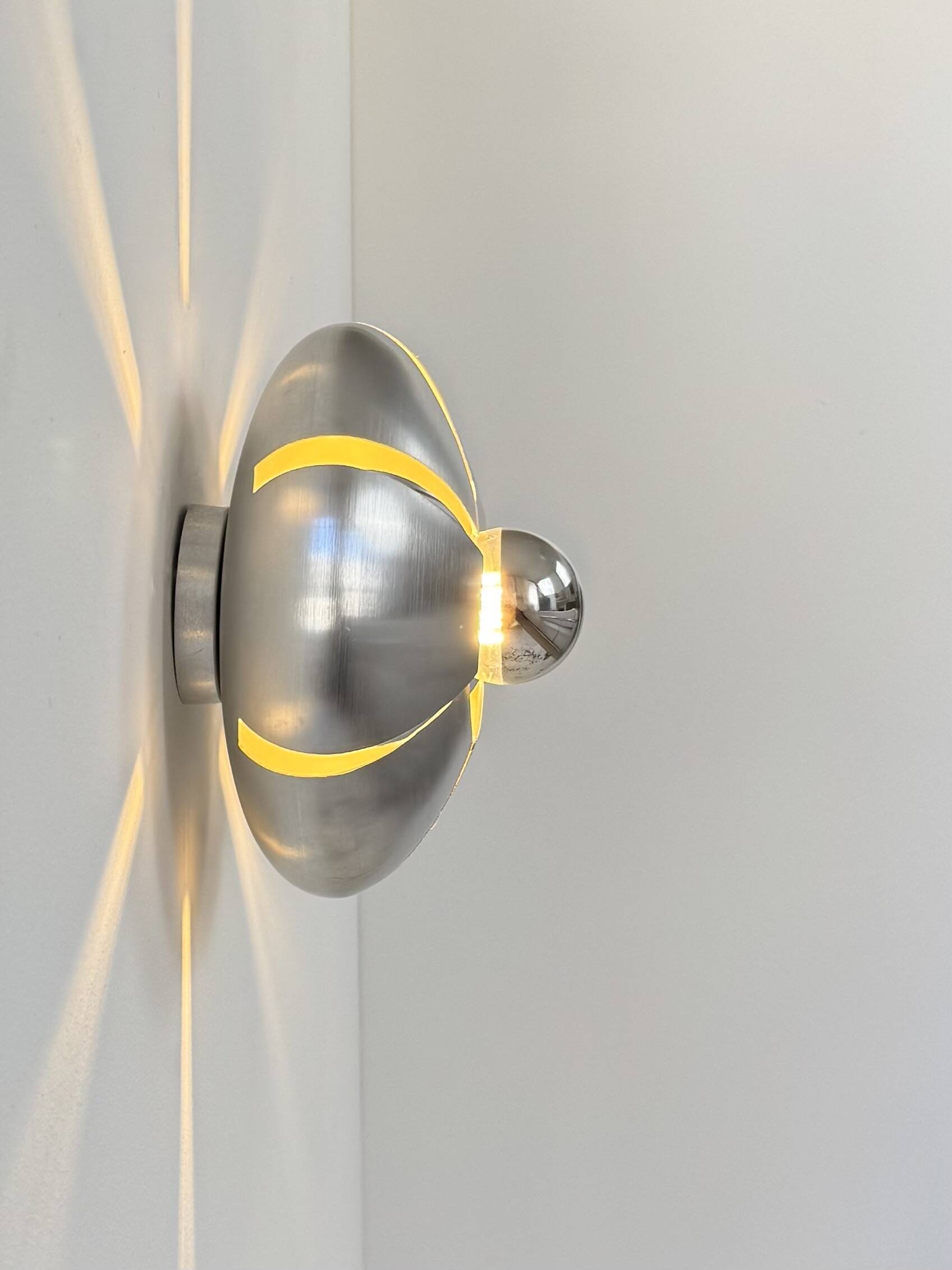 Pair of vintage wall lights, brushed aluminium, France, 1970.