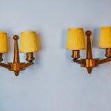 Pair of two-armed art deco "ball" wall lights, carved wood, France, 1960