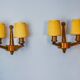 Pair of two-armed art deco "ball" wall lights, carved wood, France, 1960