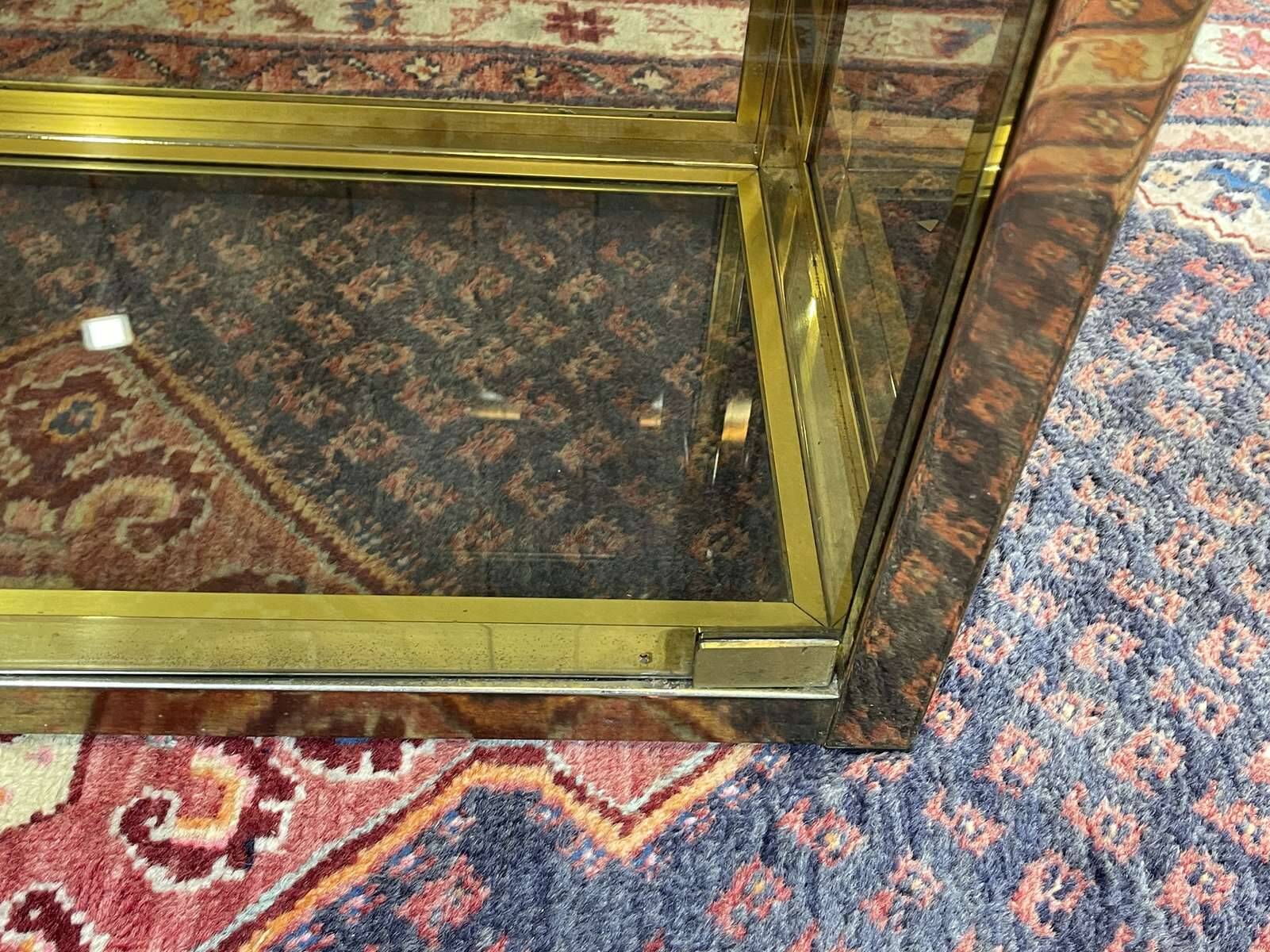 Exhibition showcase in gold-plated chrome and smoked glass - work from the 1980s.