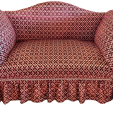 Two-seater sofa on wheels