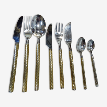 Housewife in silver and gold metal 104 cutlery