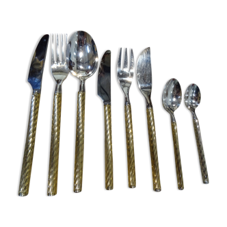 Housewife in silver and gold metal 104 cutlery