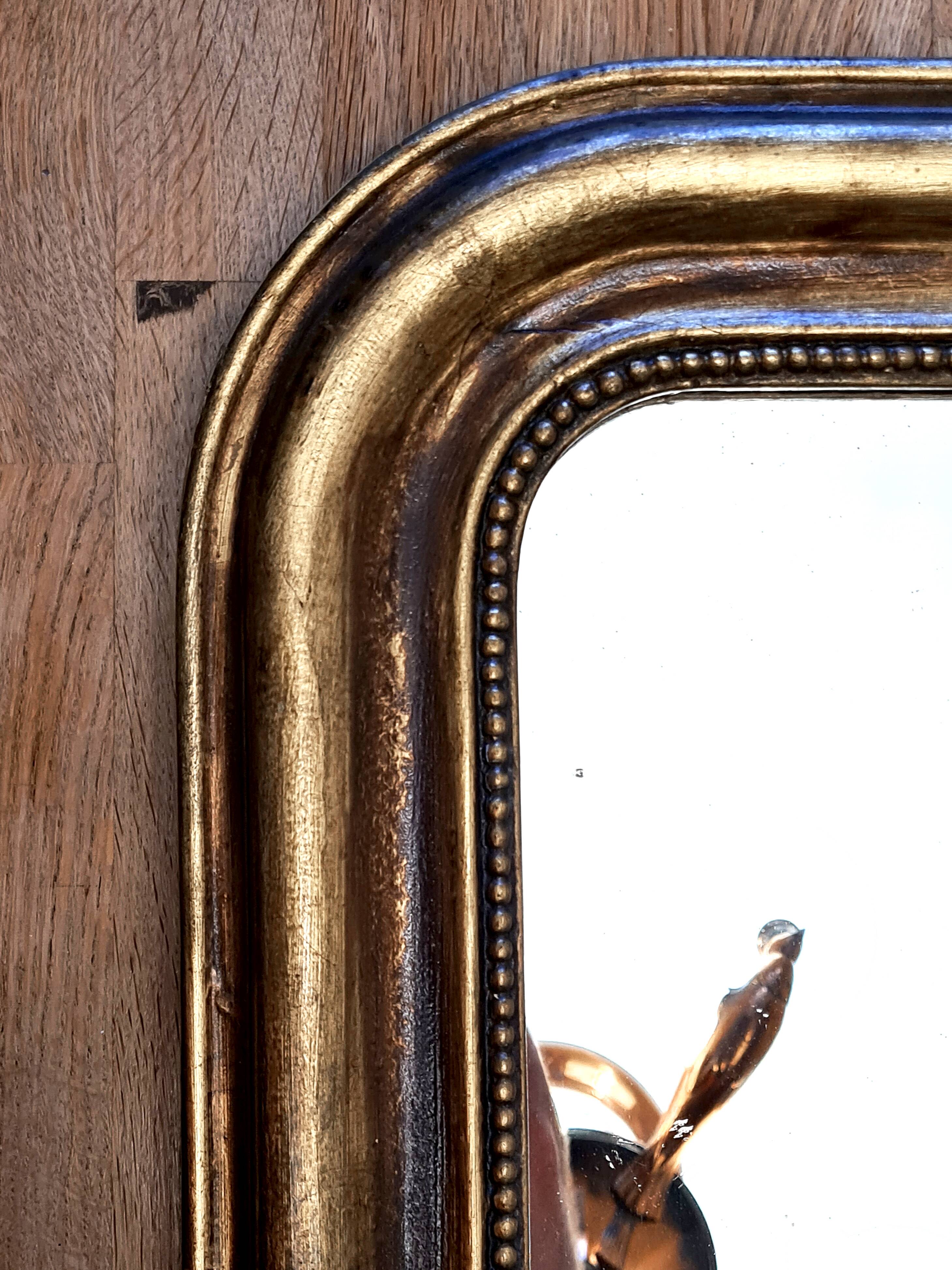 Antique Louis-Philippe gilded mirror “Apoline”