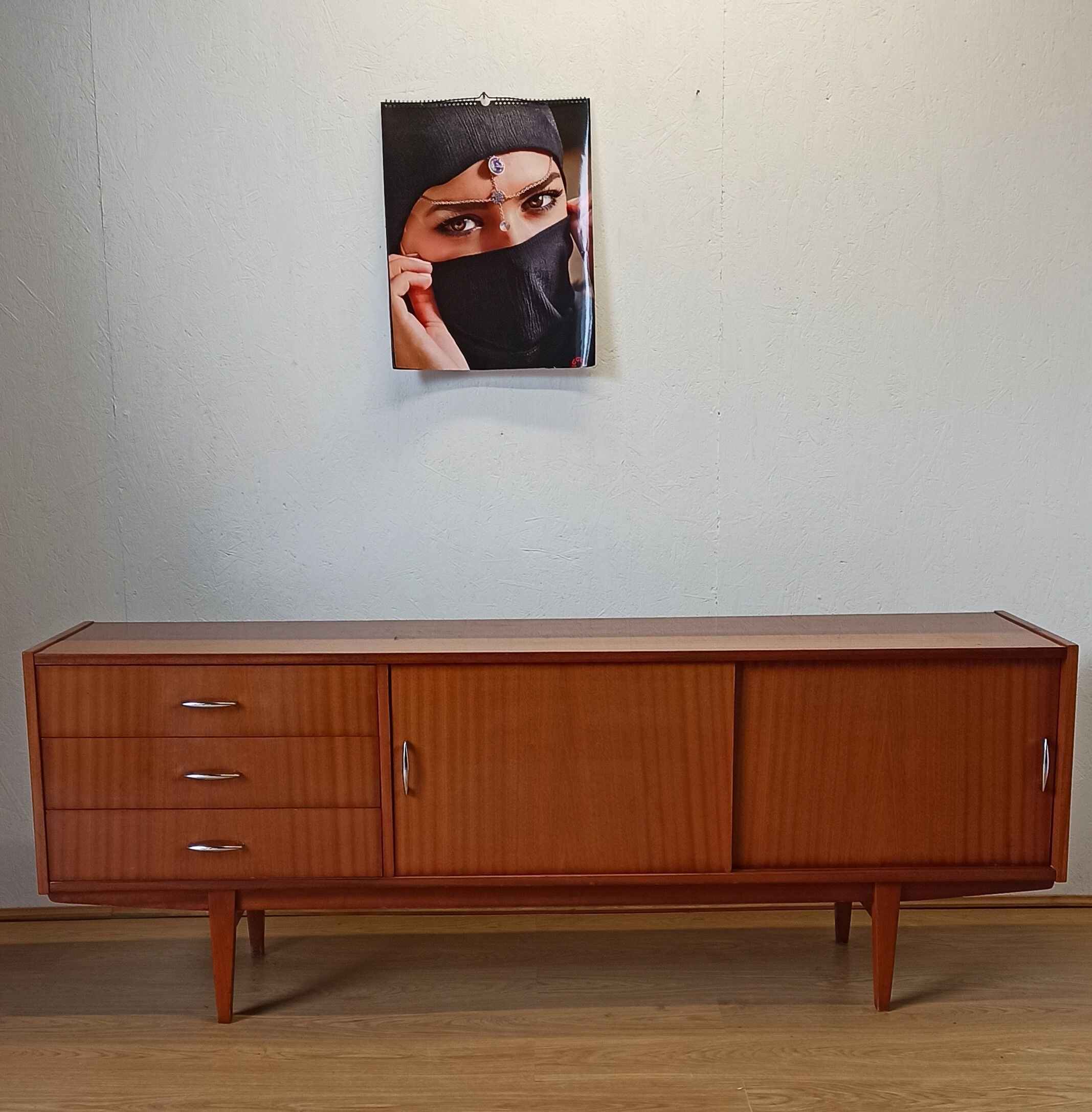 Modernist long sideboard of the 1970s.