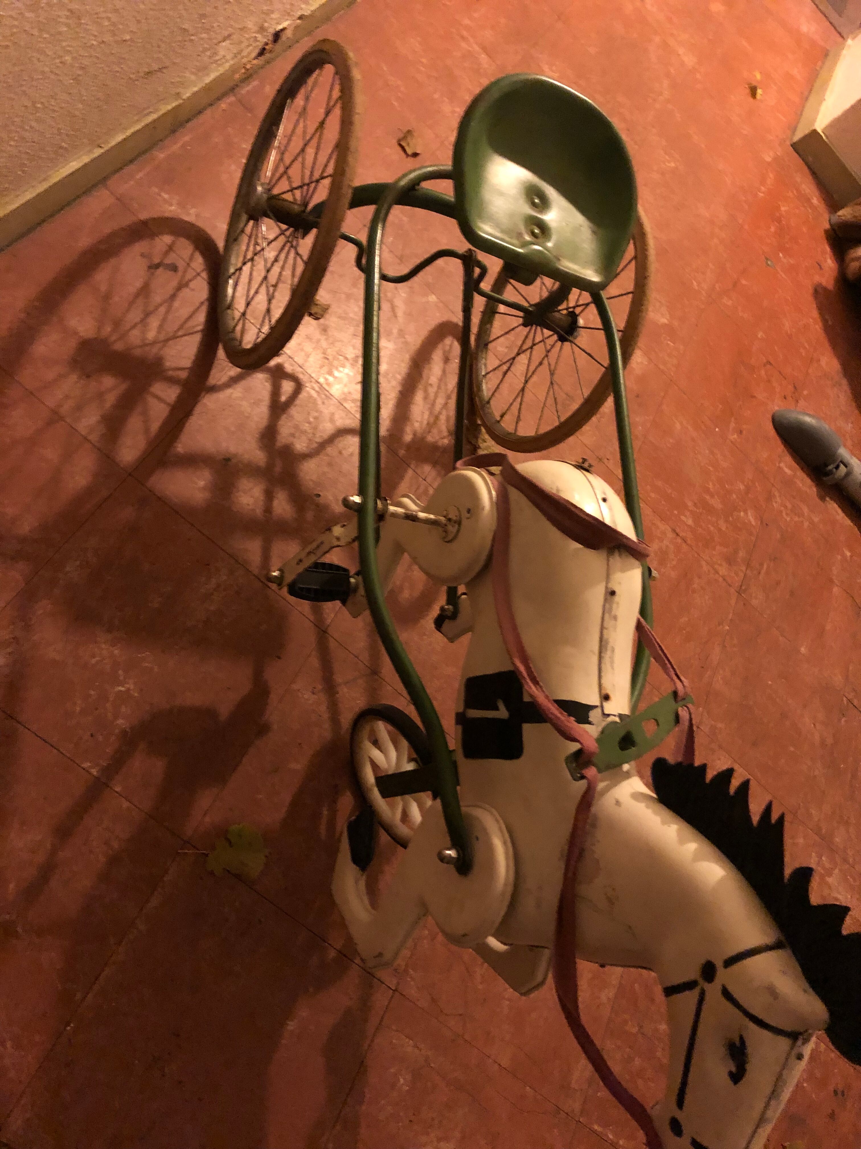 Old pedal horse with sulky