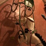 Old pedal horse with sulky