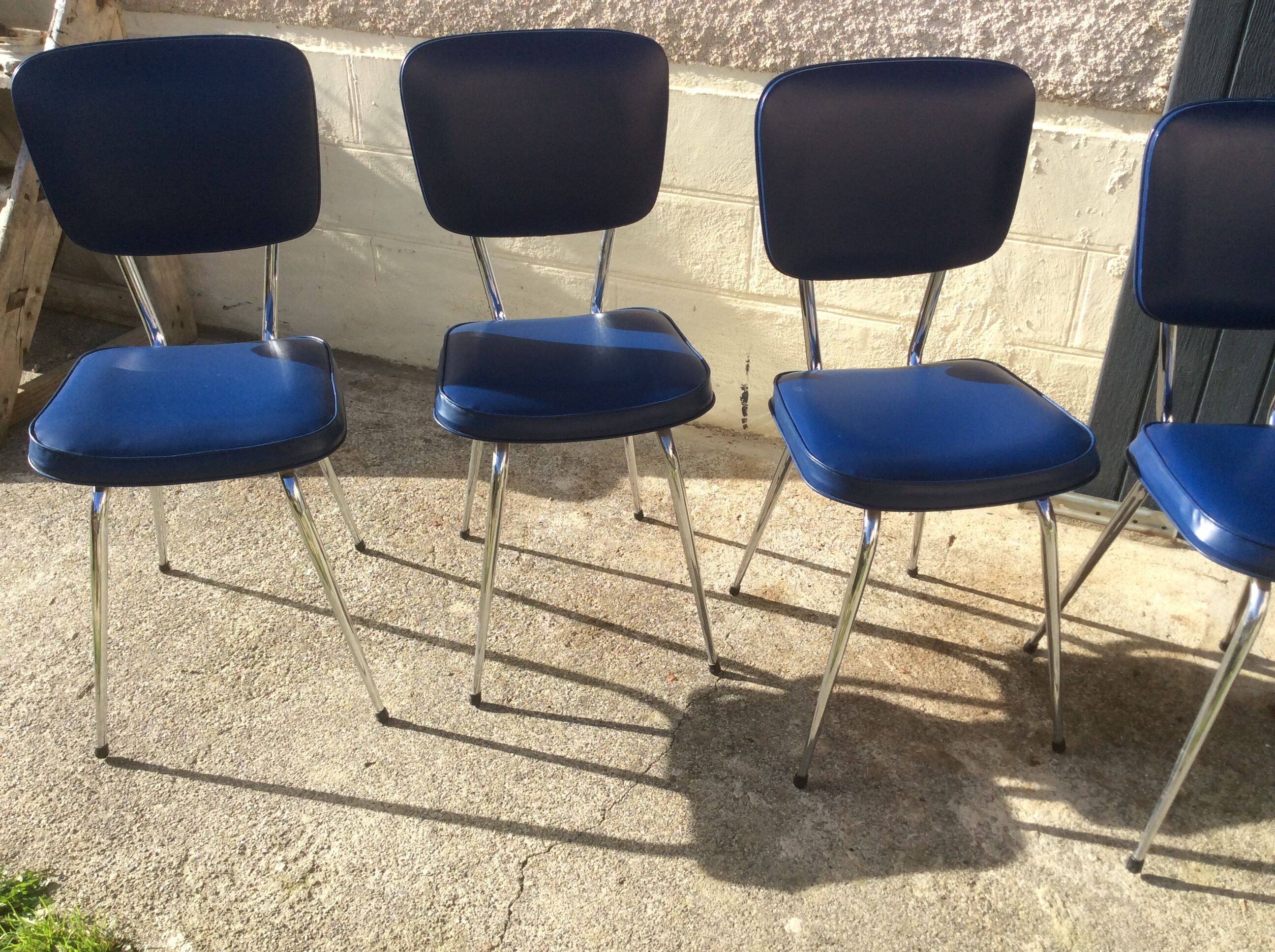 Lot from 4 vintage chairs in skai