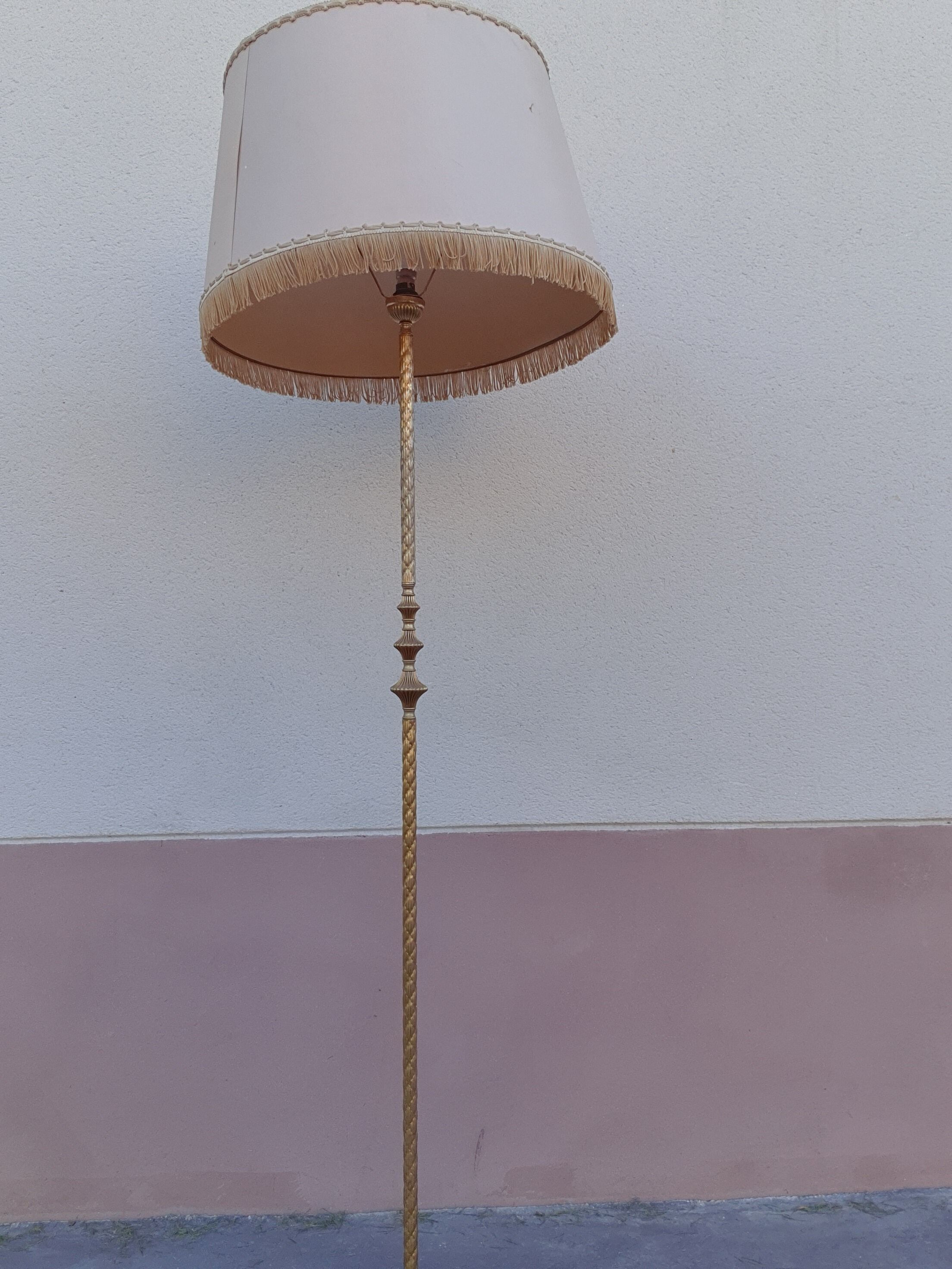 Twisted brass tripod floor lamp