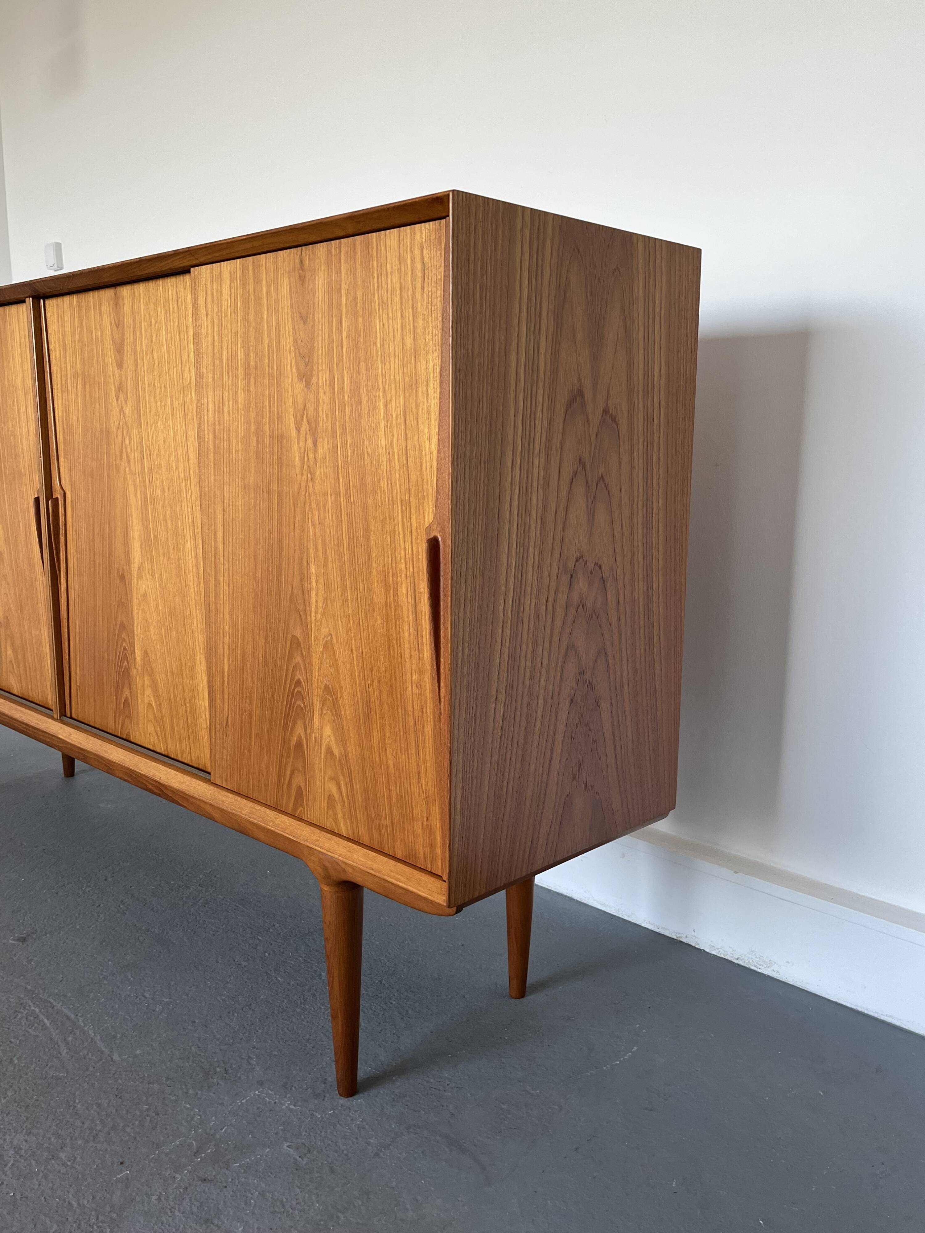 Model 19 High Sideboard in Teak with Sliding Doors by Gunni Omann for Omann Jun, 1960s