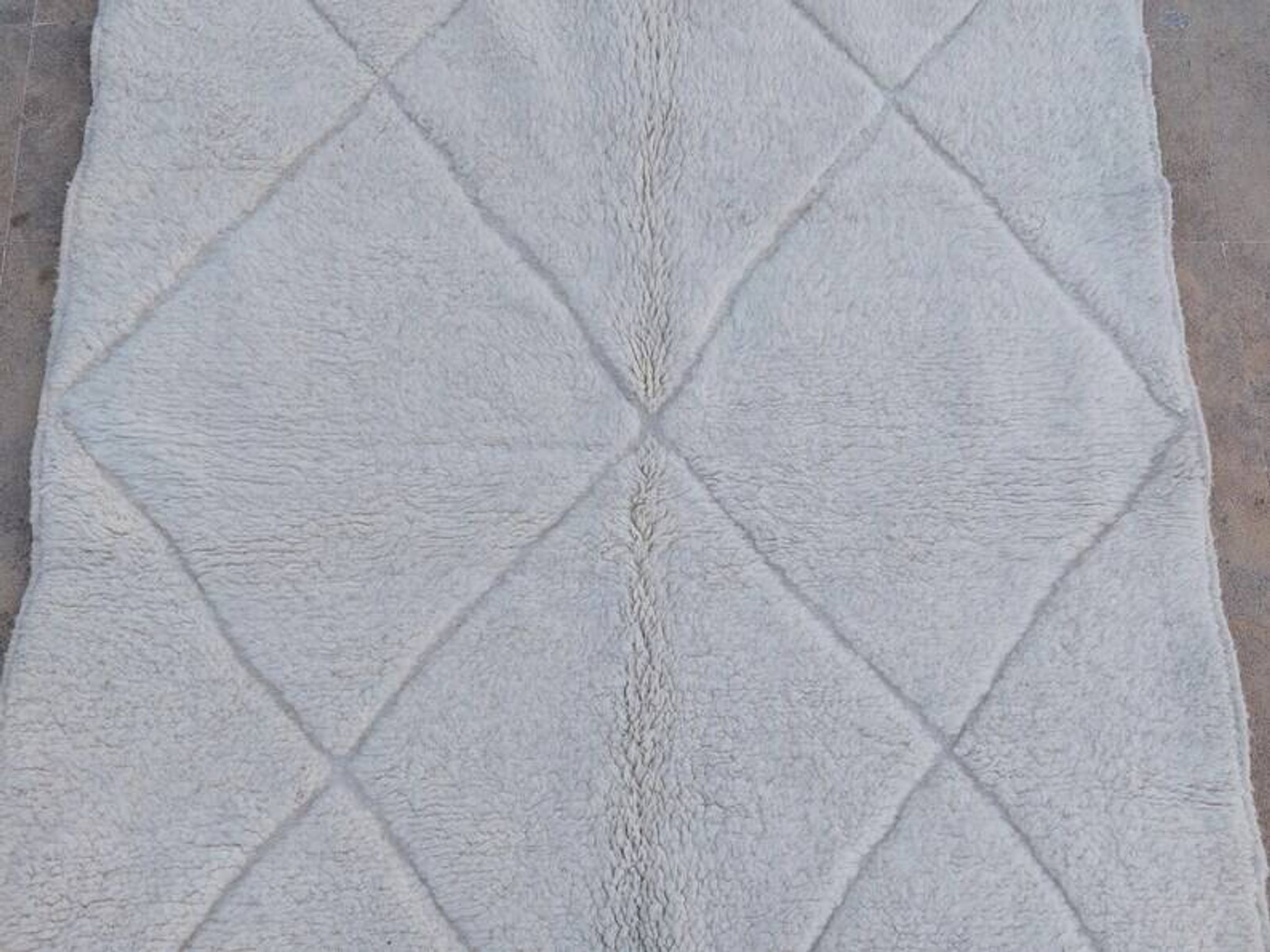Tapis blanc en laine naturelle