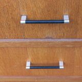 Vintage oak commode with tapered legs and wings from the 1950s.