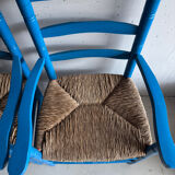 Pair of Provençal armchairs in painted wood and straw, around 1960.